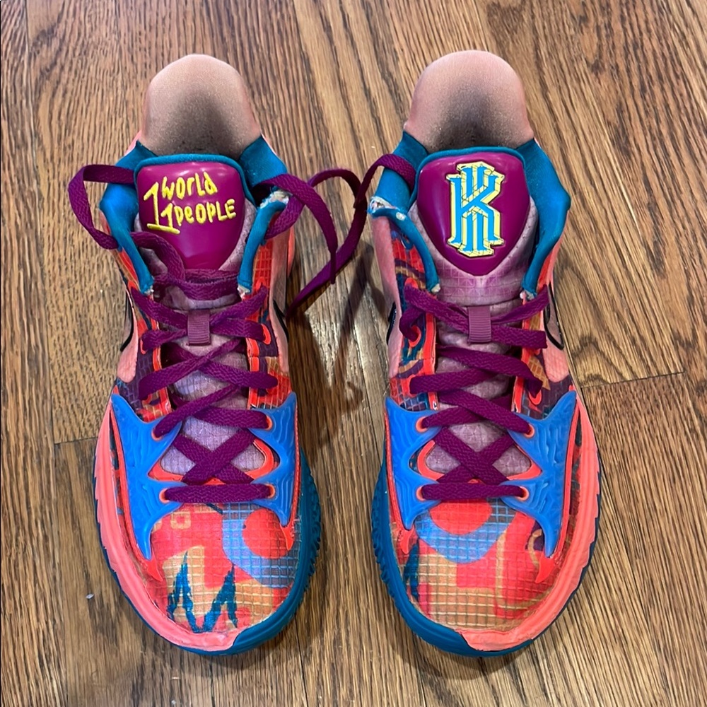 Nike Blue and Pink Sneakers with Sleek Design and Mesh Upper